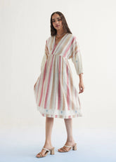 A Model Wearing Off White Handwoven Cotton The Reef Shore Cotton Off-White Midi Dress, curated by Only Ethikal